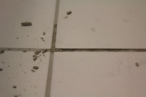 Start By Removing the Grout from The Tiles