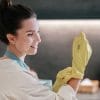 Cleaning. young dark-haired woman cleaning in the kitchen Free Photo
